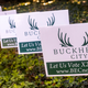 Yard signs supporting a movement to incorporate Atlanta’s Buckhead neighborhood, pictured on Monday, Sept. 27, 2021. Bill White, a New Yorker who relocated to Georgia and has become the face of the movement, recently retweeted a web site known for peddling bigotry.